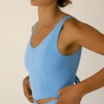 Women's blue sports top with back bow