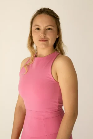 Top d'esport rosa per dona, coll halter i llaçada a l'esquena